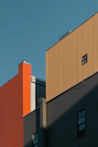 a tall building with a clock on the side of it