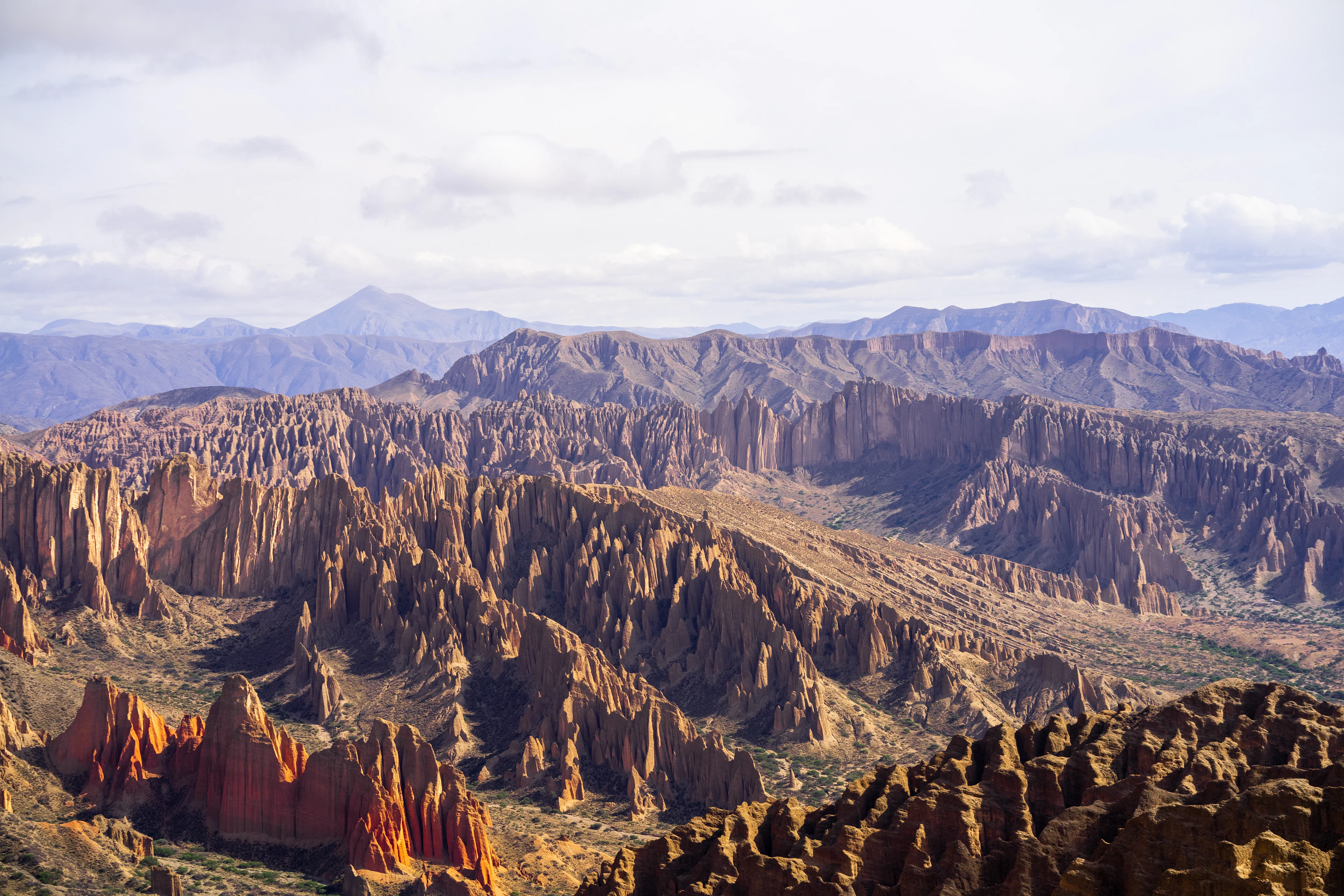 Red rock spires and canyons outside Tupiza, with Andean ridges in the distance