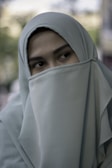 woman wearing blue hijab scarf