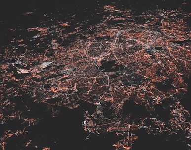 lighted city at night aerial photo