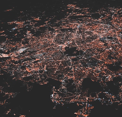lighted city at night aerial photo
