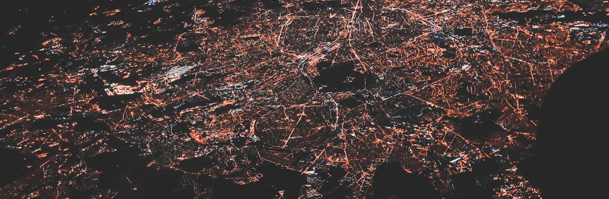 lighted city at night aerial photo