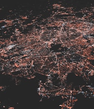 lighted city at night aerial photo