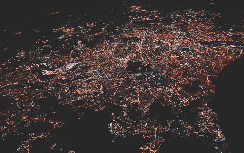 lighted city at night aerial photo