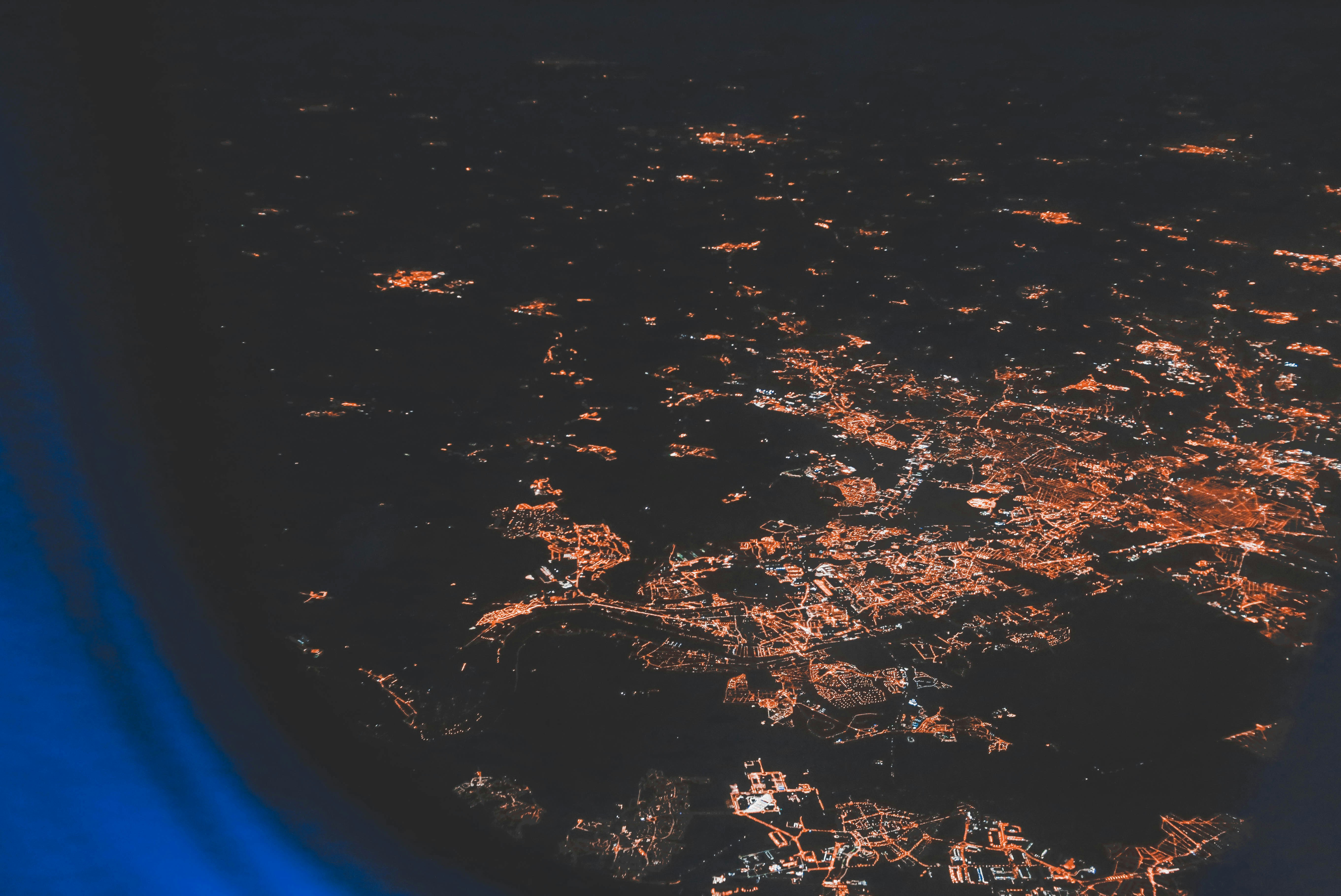 Aerial View Of City Lights Over The Aircraft Window Photo Free Image On Unsplash