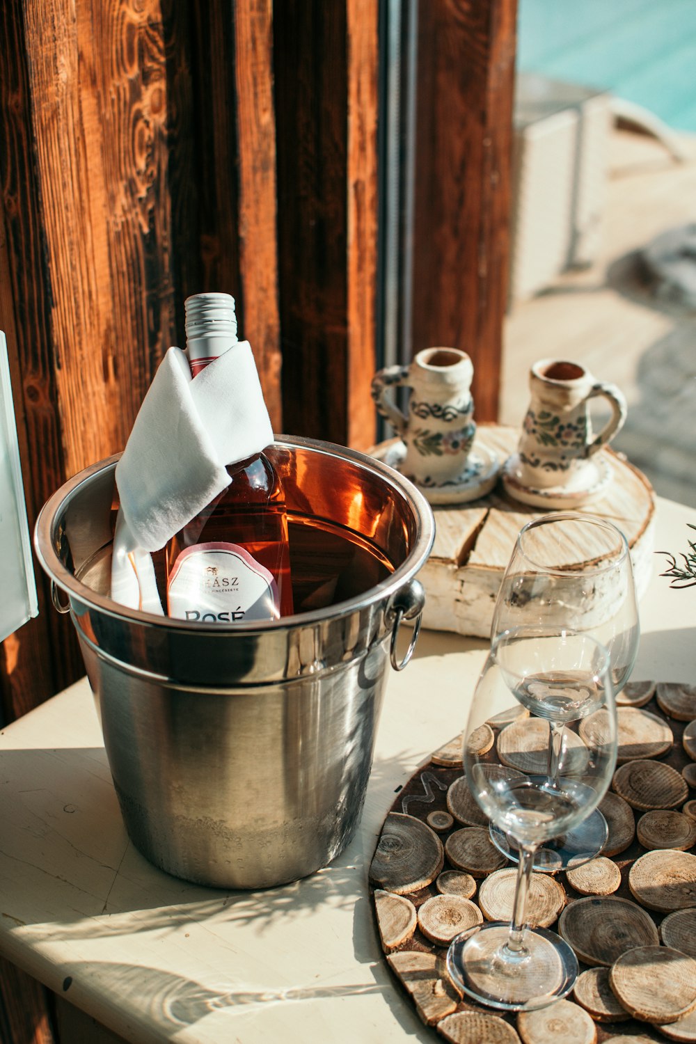 white Rose labeled bottle in bucket