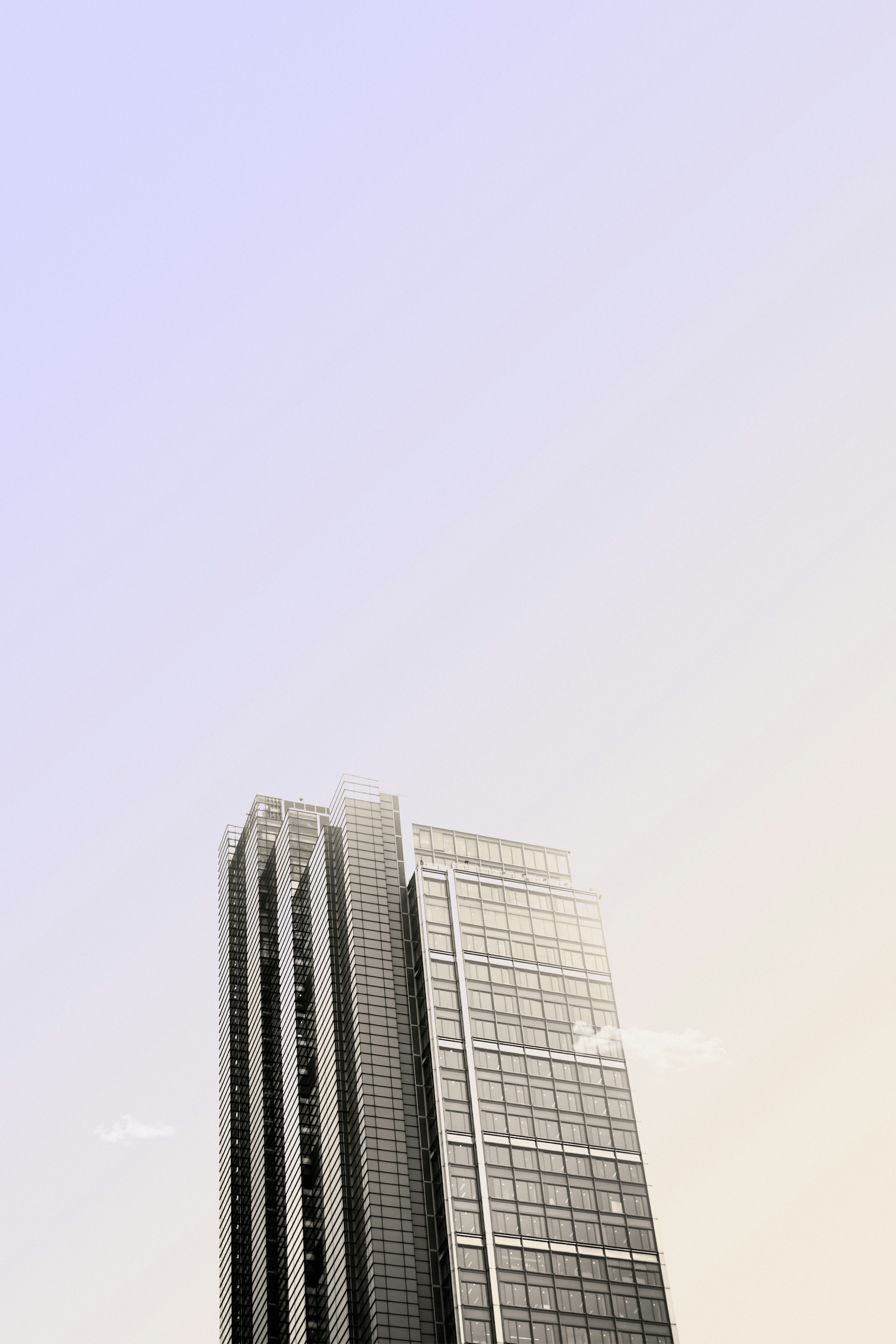 grayscale photo high rise building