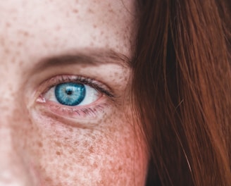 person's blue eye