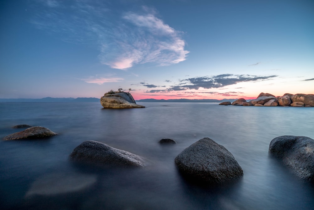 timelapse photography of stony beach during day time