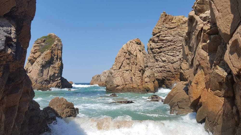 rocky mountain near the ocean