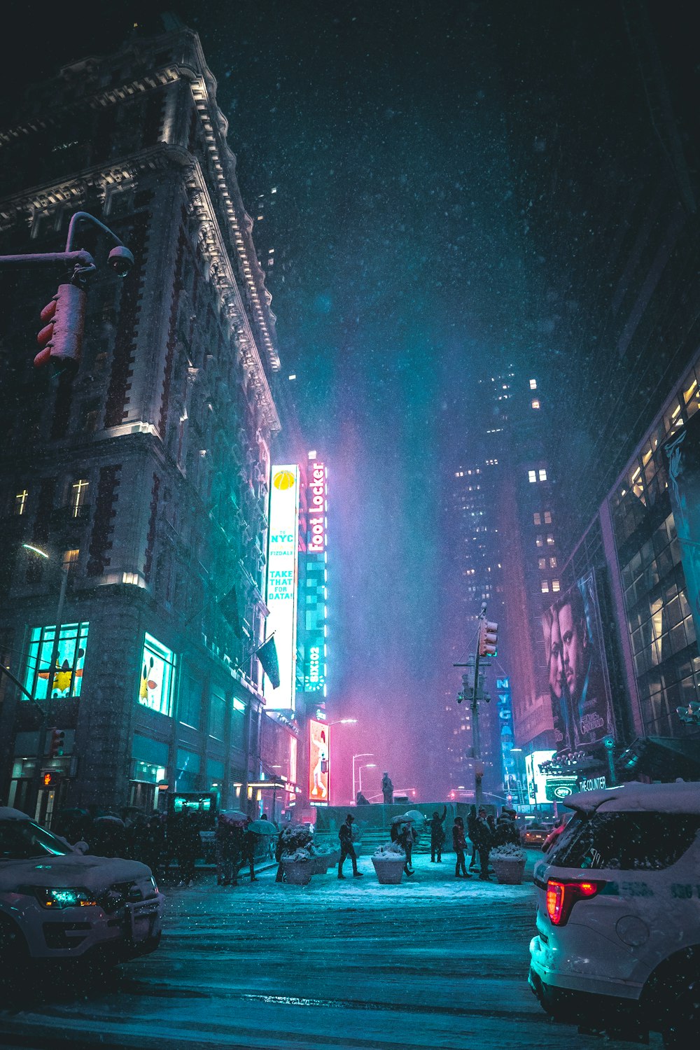 people walking near road and different cars on road during night time