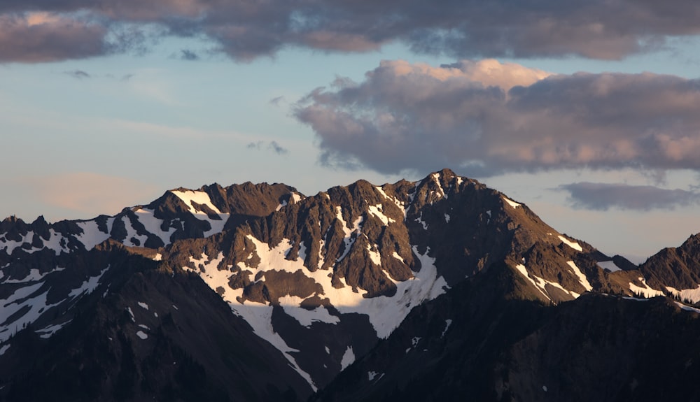 snow capped mountain under blue sky