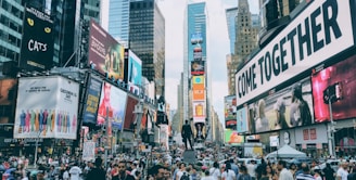 people in busy city street