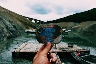Open can of Simak sardines glistening in sunflower oil.