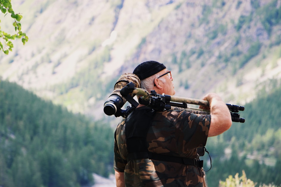 Game bags with elk meat hung from tree in backcountry