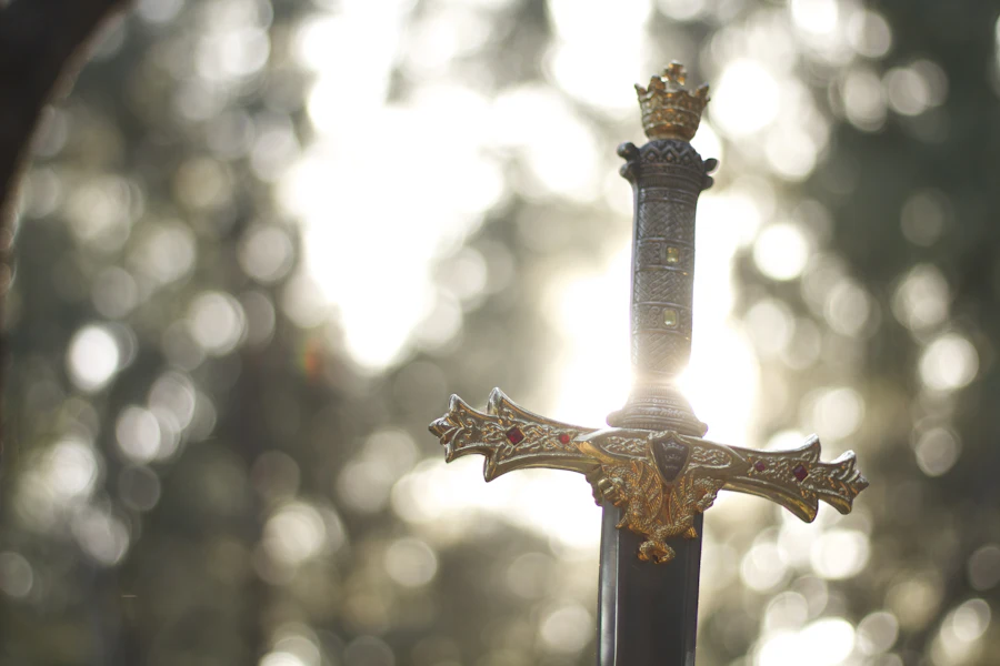 Close-up of an ornate gold and black sword
