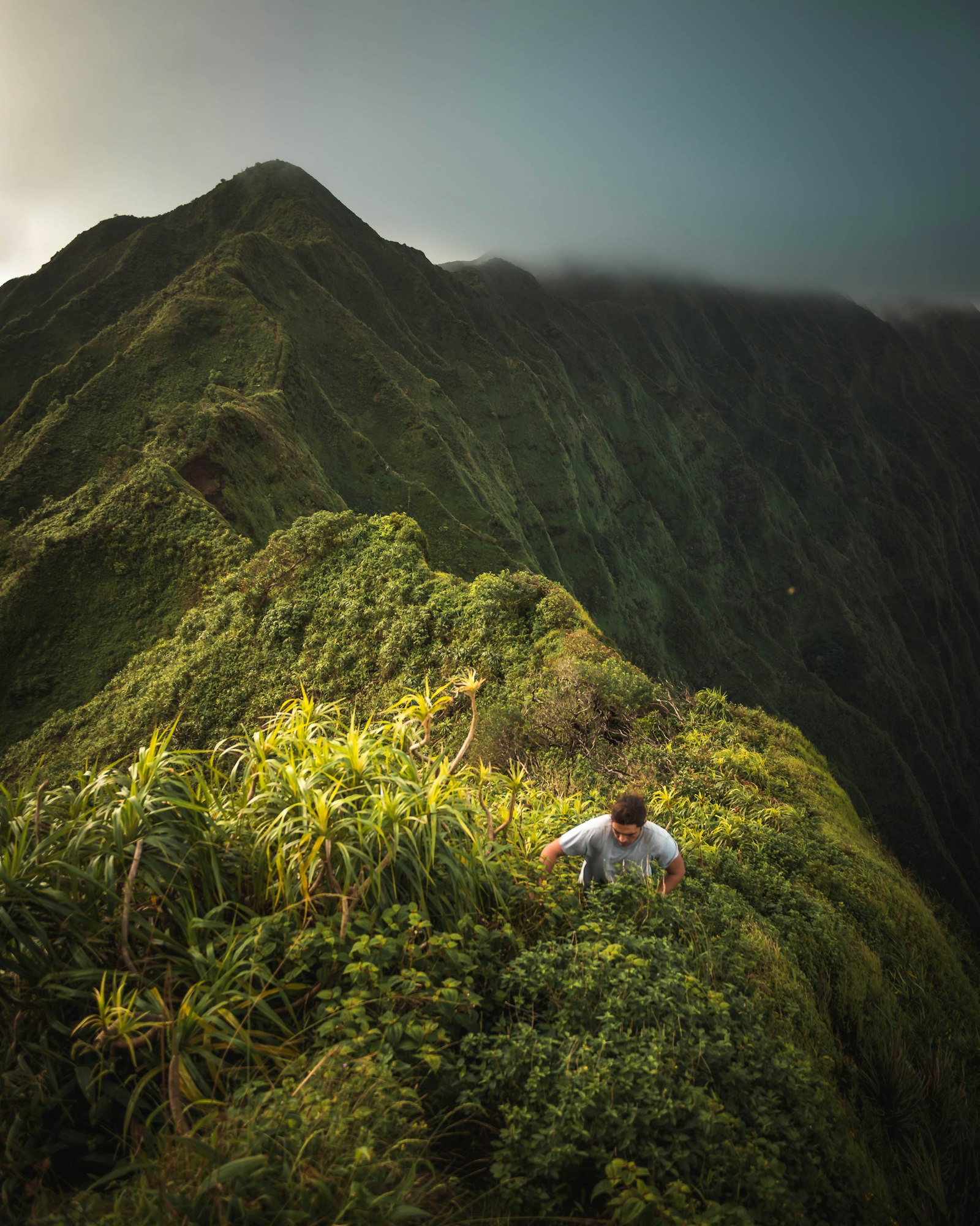 Panasonic Lumix G 14mm F2.5 ASPH sample photo. Man standing on mountain photography