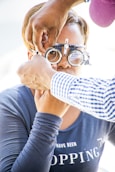 person wearing loupe glasses