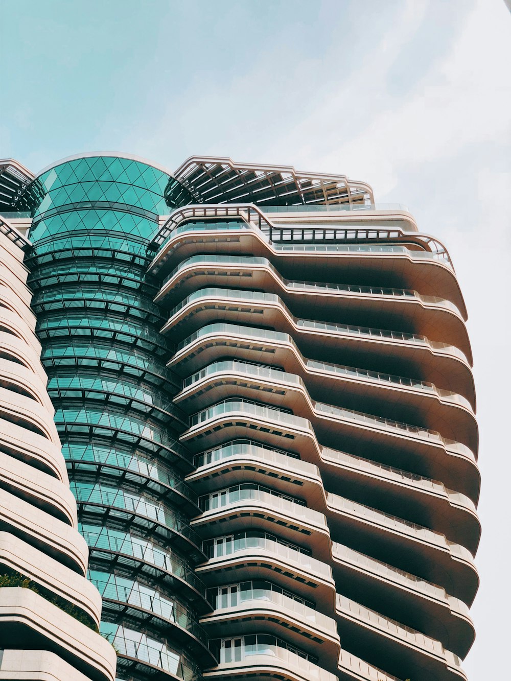 low angle photo of architectural building under blue sky