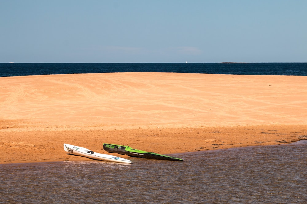 two kayaks near sea