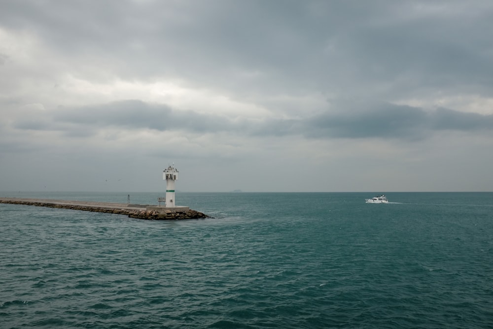 boat near lighthouse