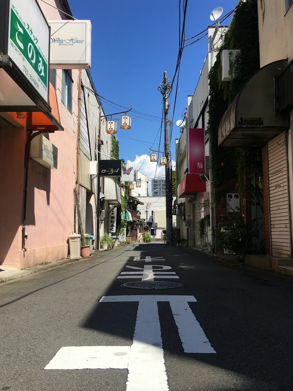 road between buildings during daytime