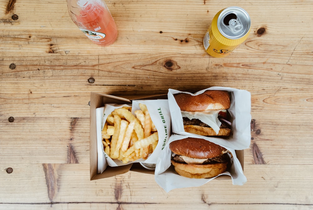 burger and fries with box