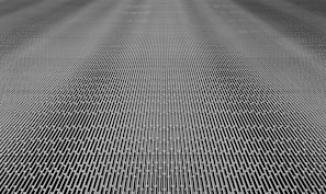 A close-up of a metal mesh structure with intricate interlocking patterns forming a grid-like appearance. The surface is composed of repetitive linear elements creating a sense of depth and complexity.