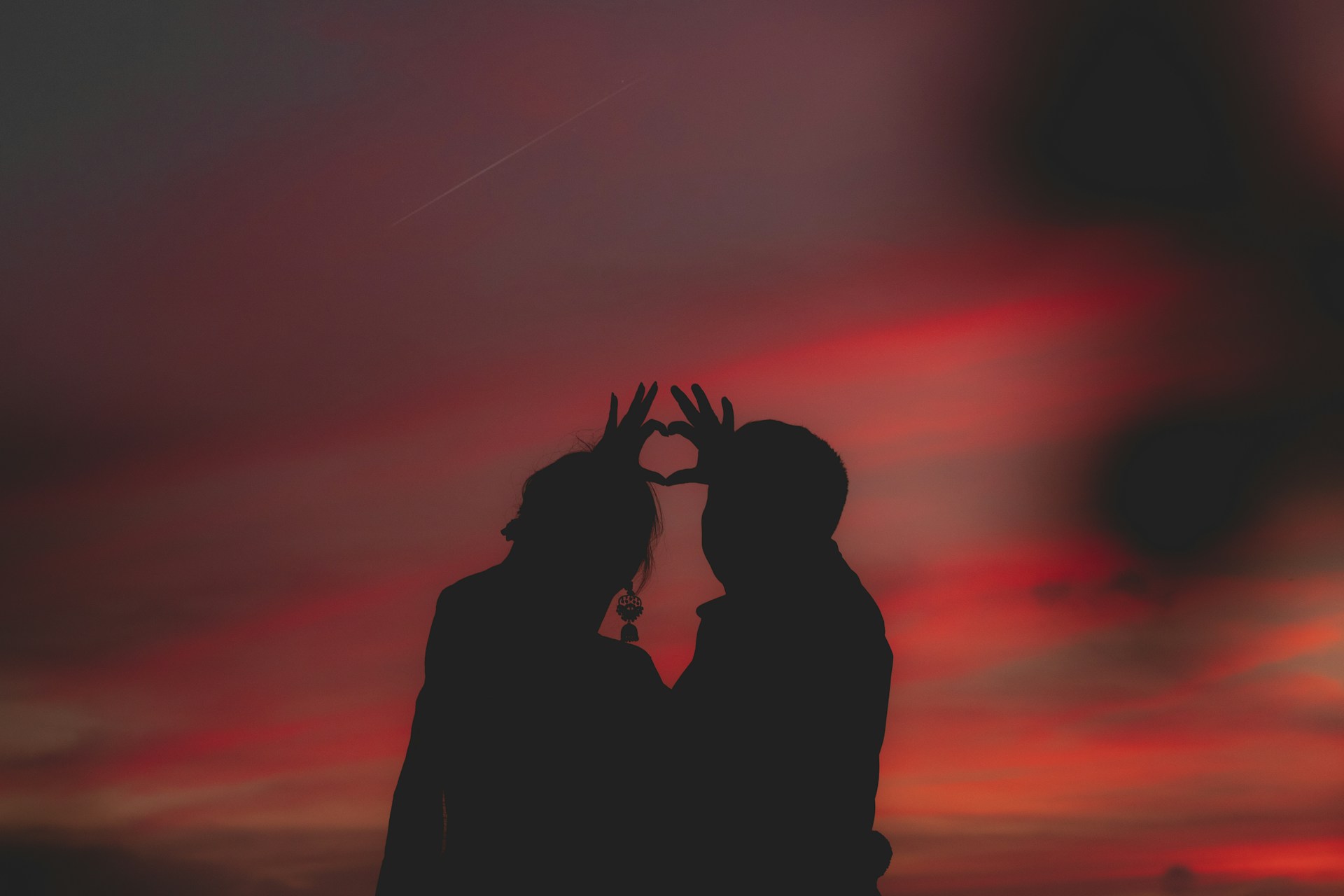 silhouette photography of two person