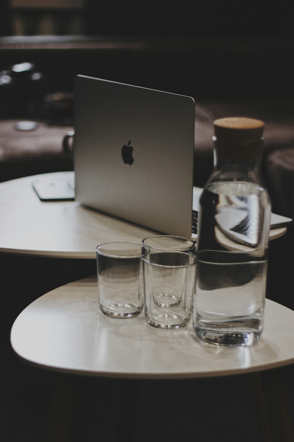 bottled water and 2 drinking glass