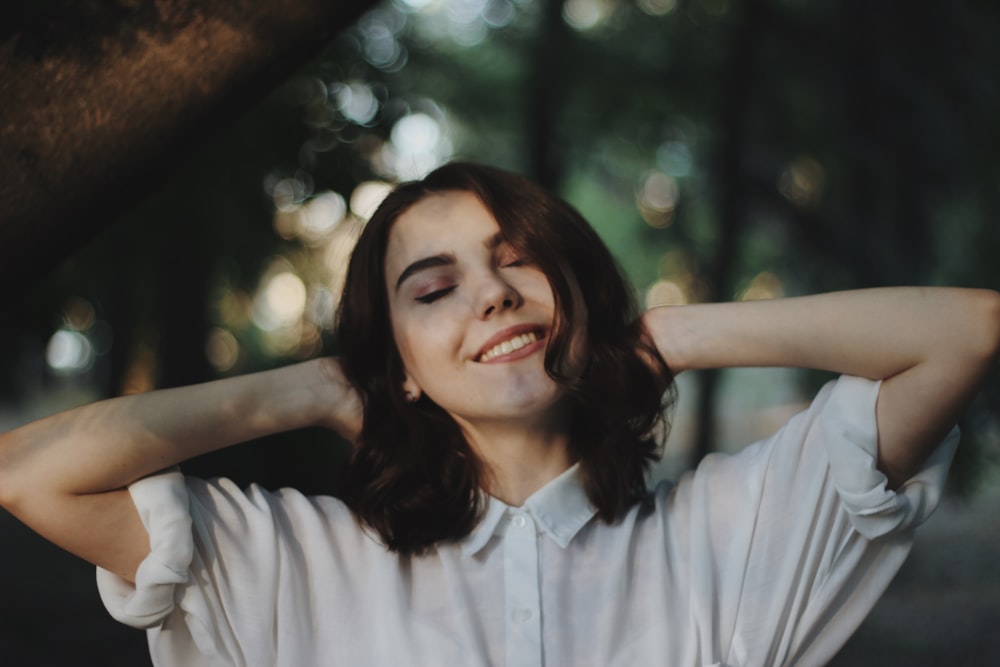 woman smiling selective photography