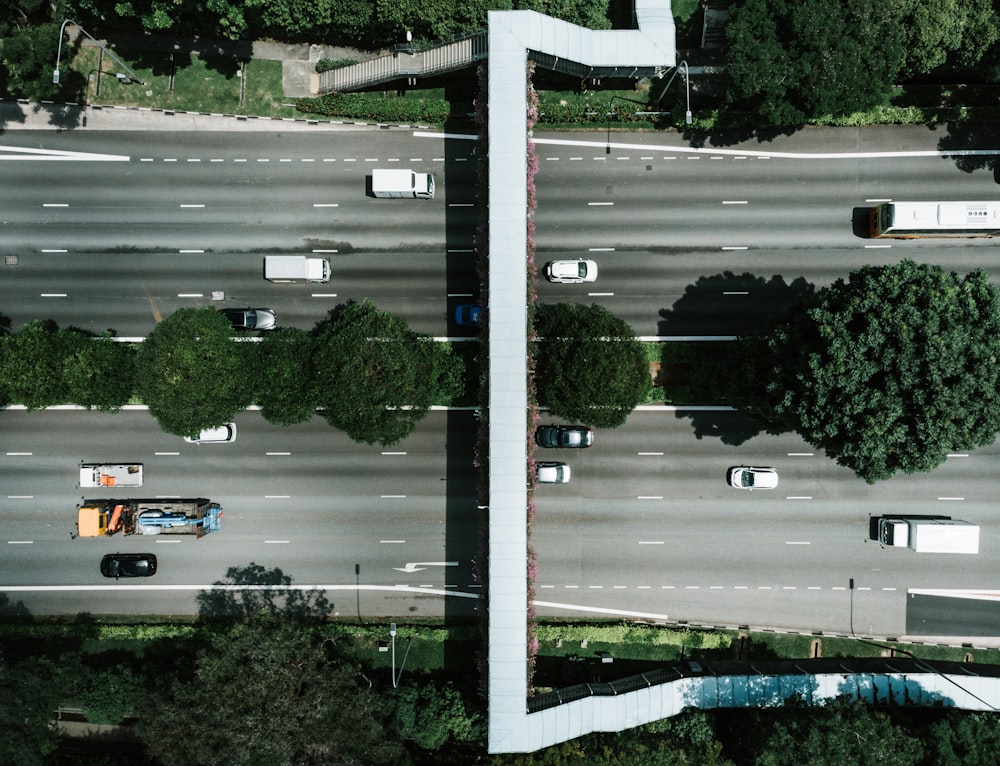 aerial photography of vehicle traveling on road during daytime