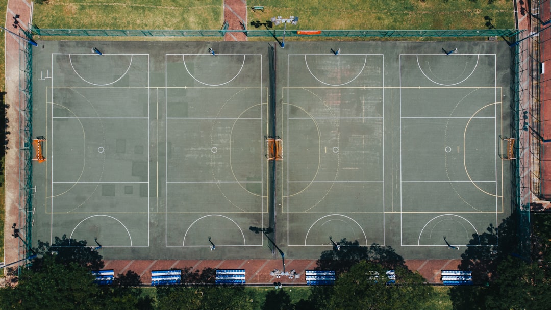 empty concrete court in aerial view photography