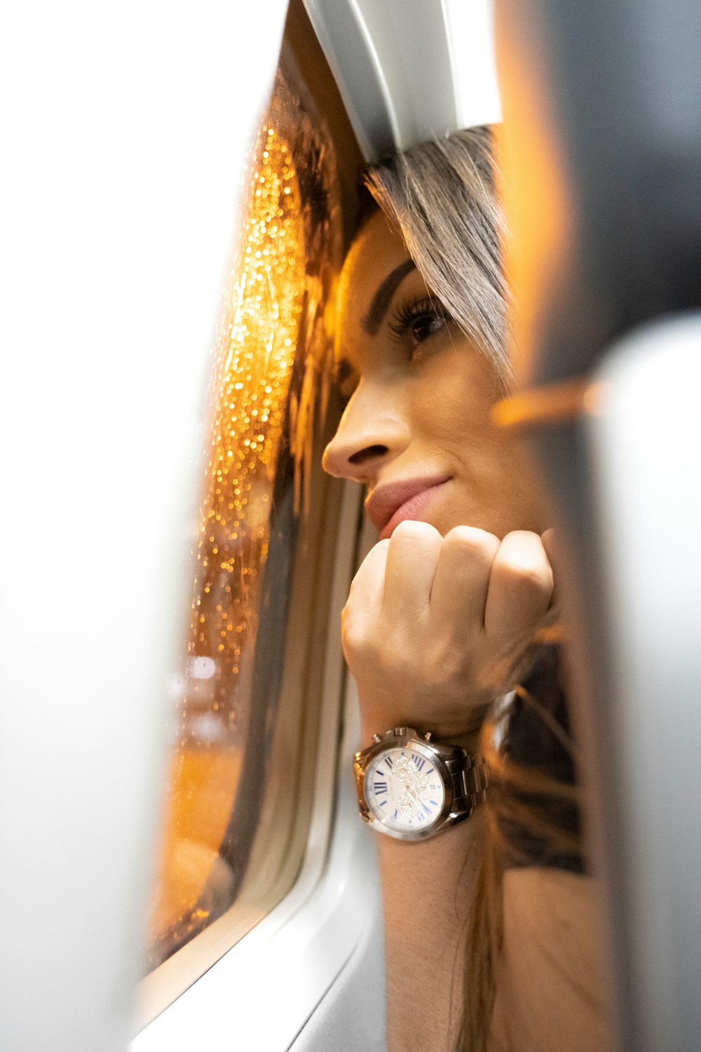 woman looking at window