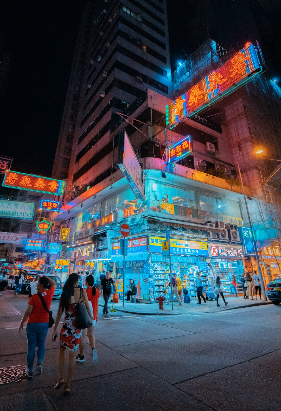 people walking on street during night