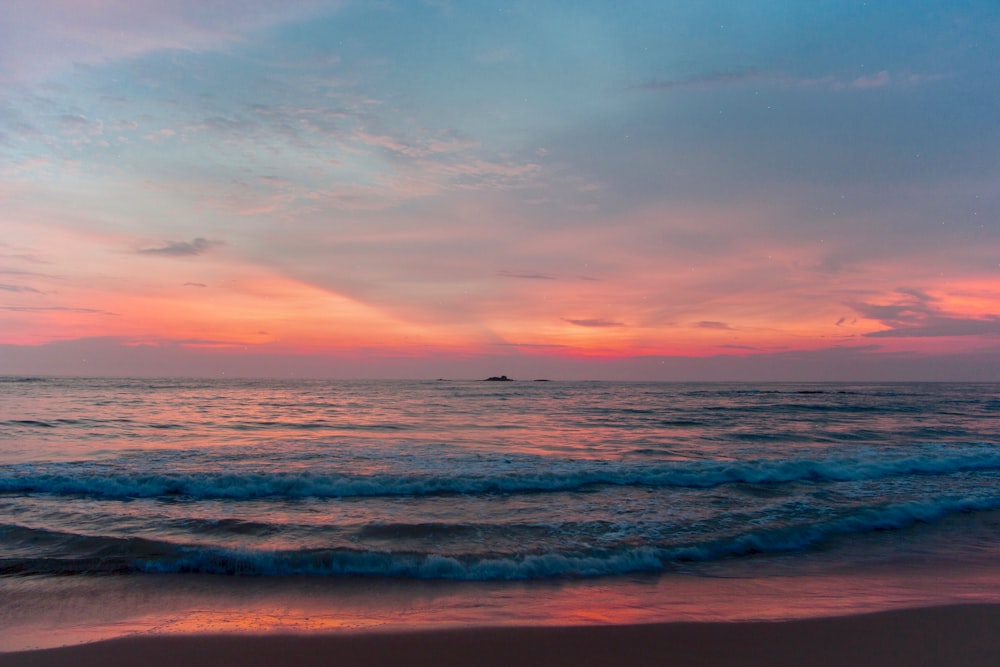 ocean under blue sky