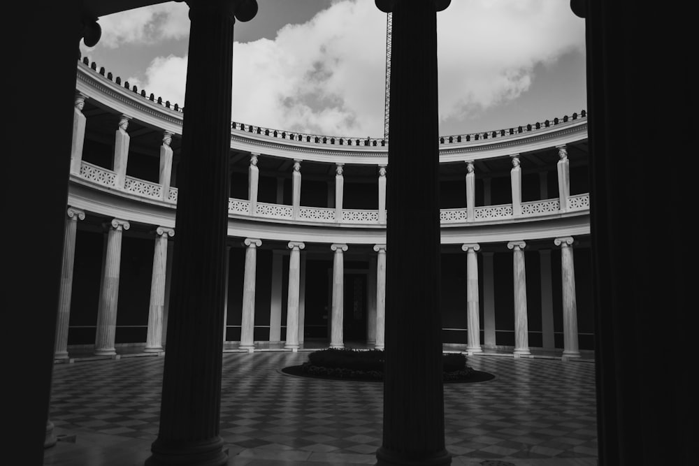 a black and white photo of a circular building