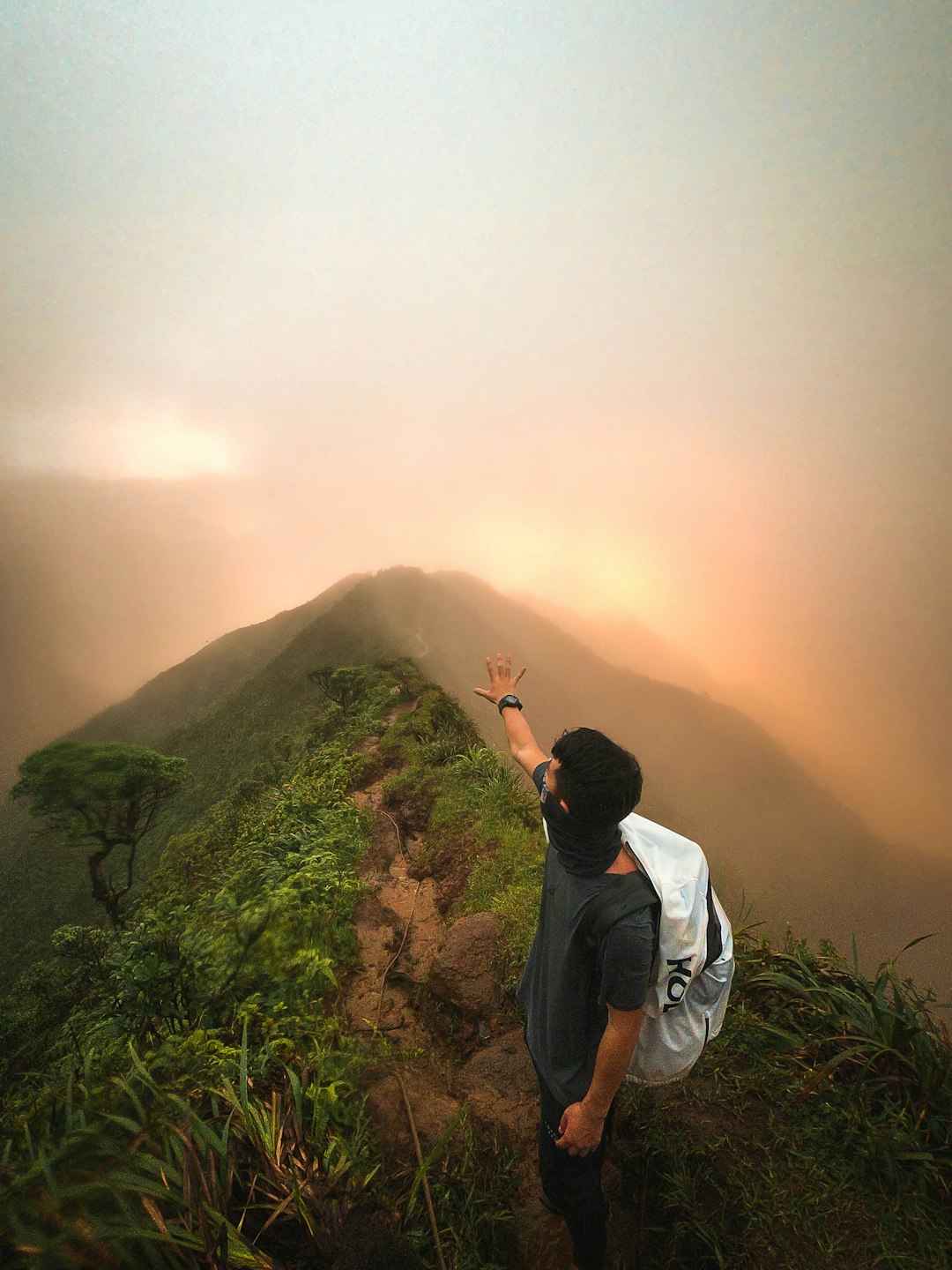 man standing on mountain