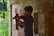 Close-up of a violinist passionately playing in the château’s garden.