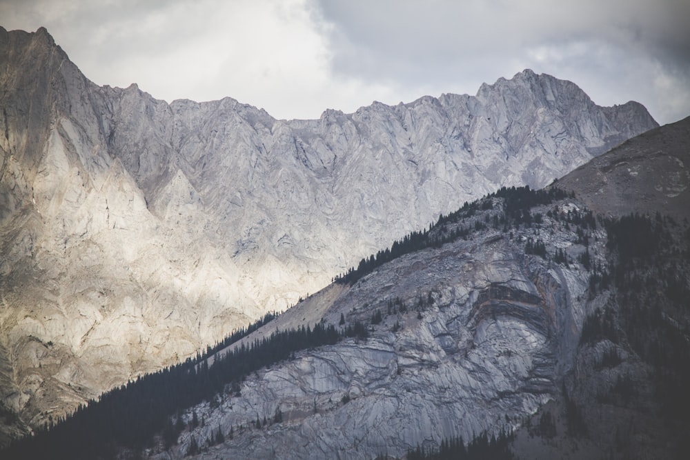 gray mountains under gray sky during daytime