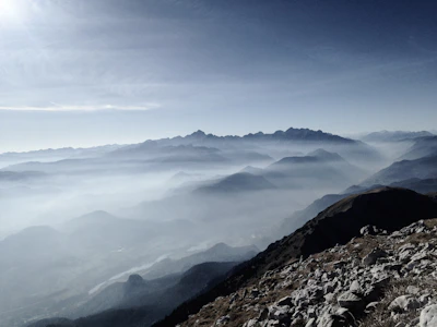 Zephyrath’s vast, mist-shrouded plains stretching toward distant mountains.