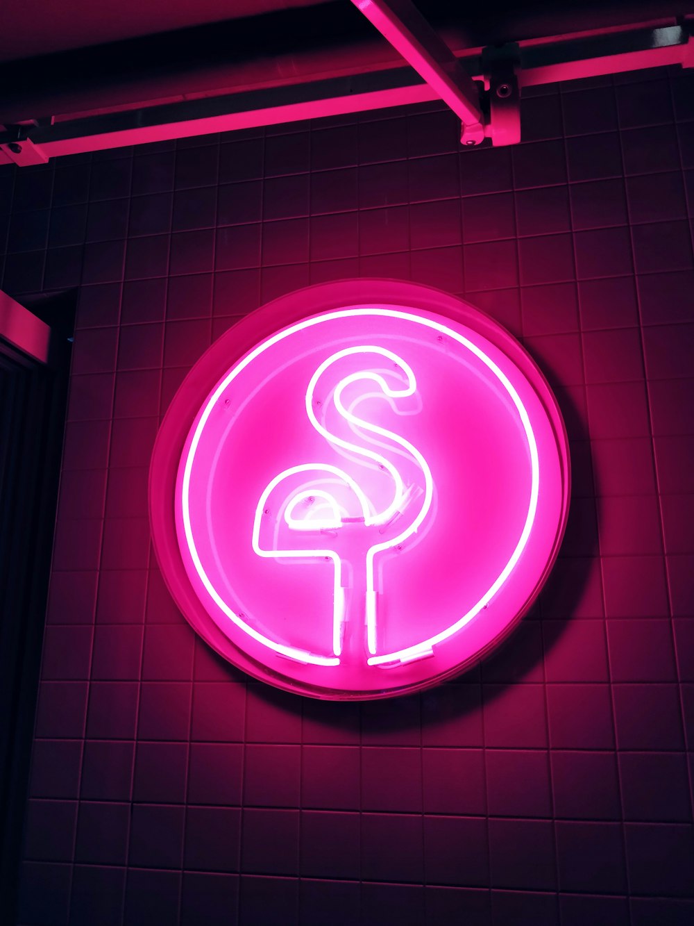 pink and white round neon sign