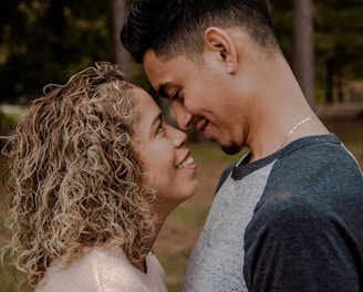 couple standing face to face closely to each other