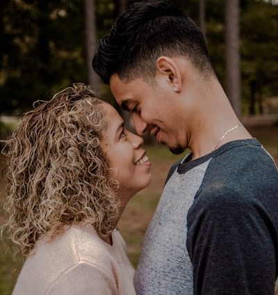 couple standing face to face closely to each other