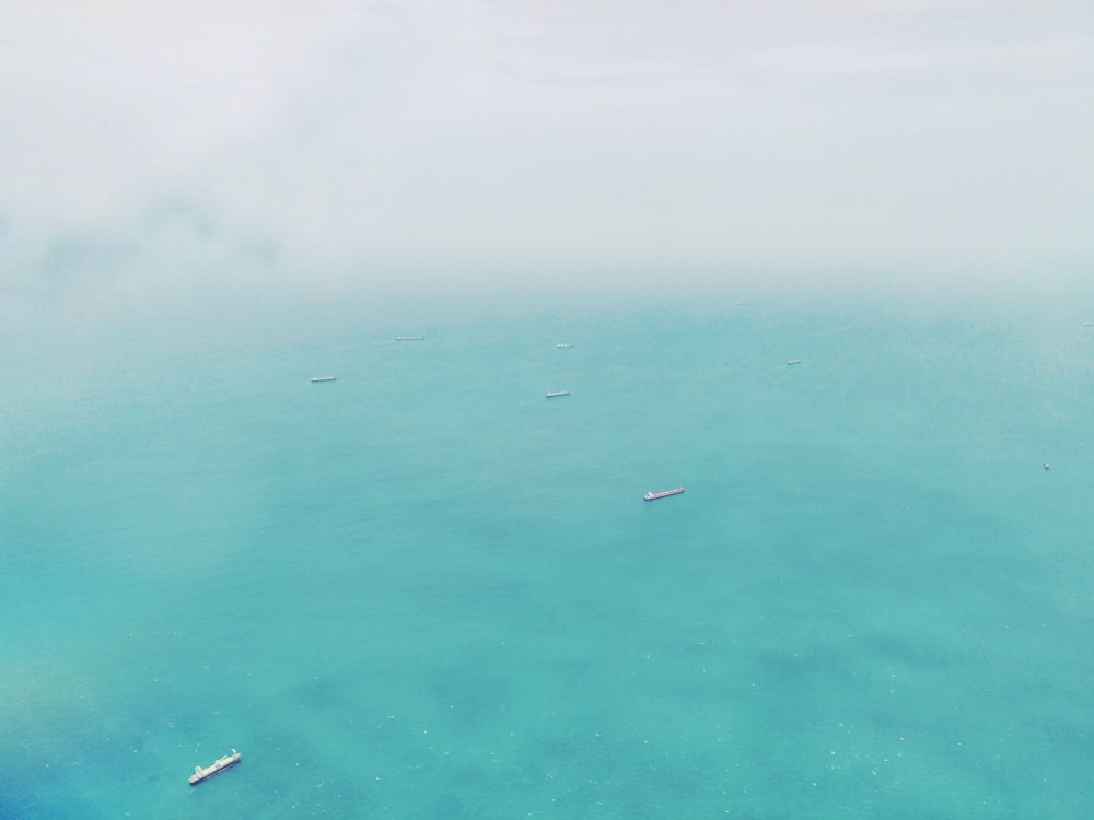 aerial photography of ships on ocean