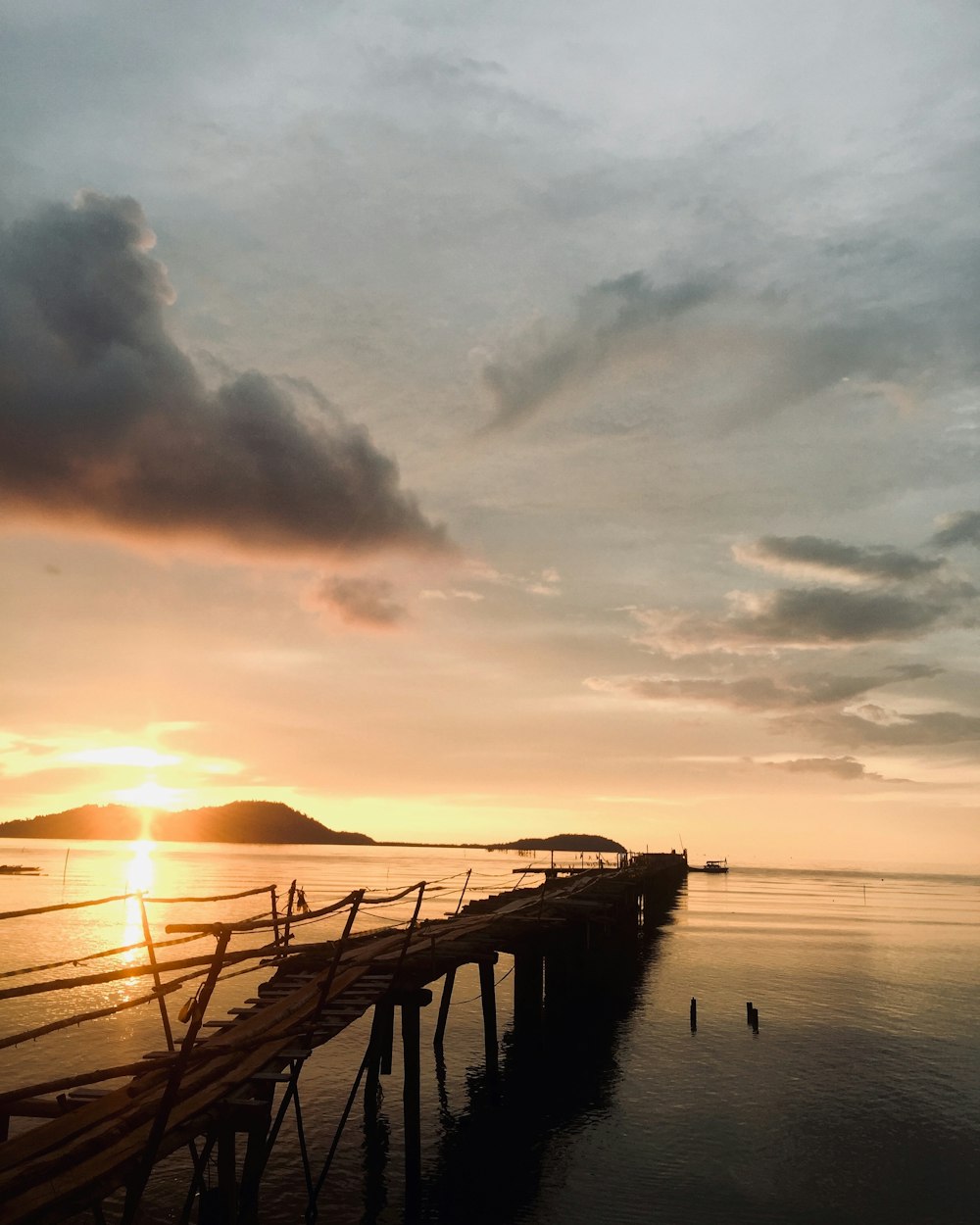 silhouette of bridge during sunset