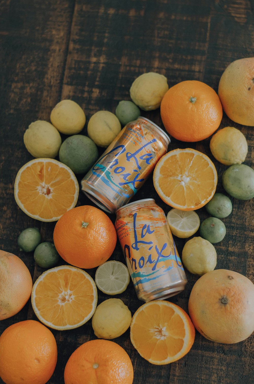 orange and citrus fruits and La Croix cans