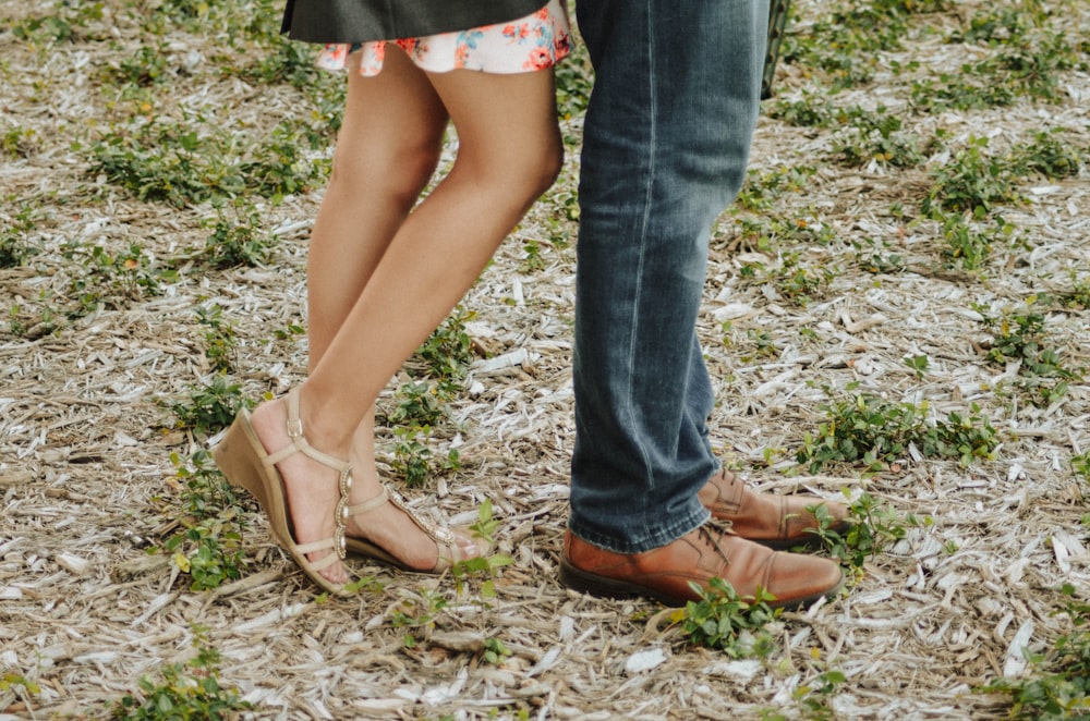 woman and woman on grass field during daytime