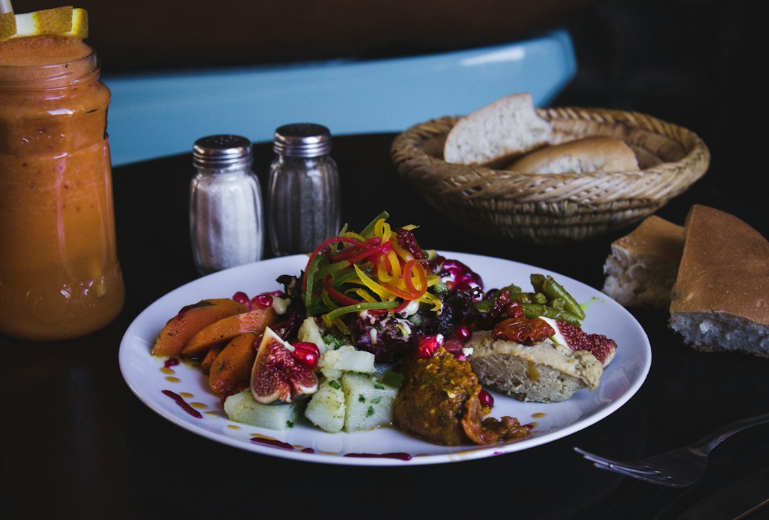 foods served on plate with spices on table,