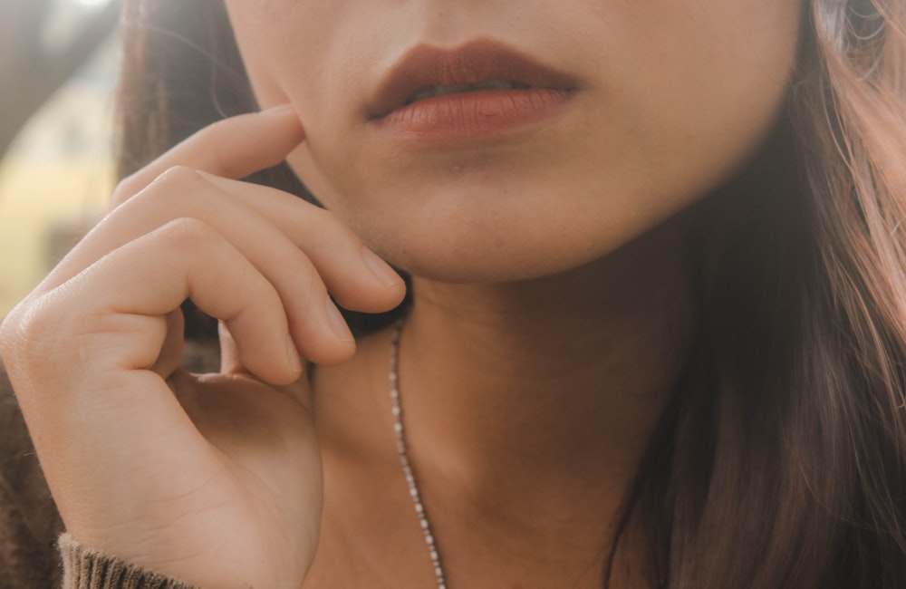 women's face close-up photography